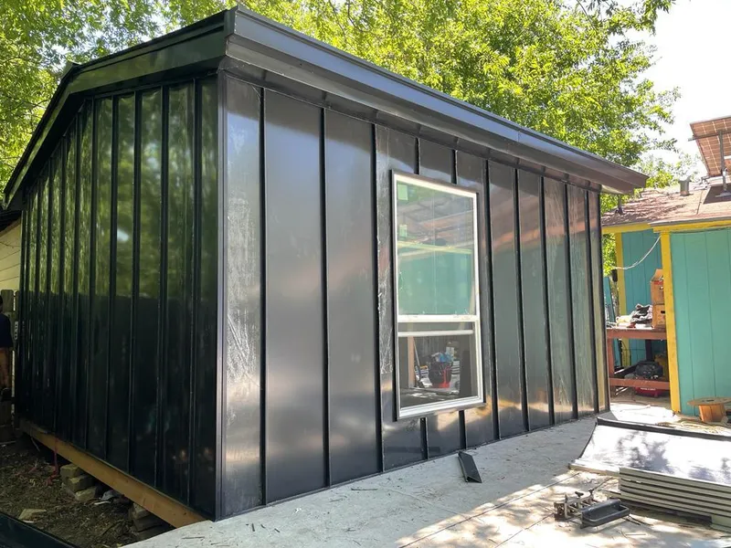 Black standing seam metal wall panels for Roof Inspection in Morro Bay